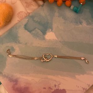 BN out of box - silver tone interlocking heart bracelet